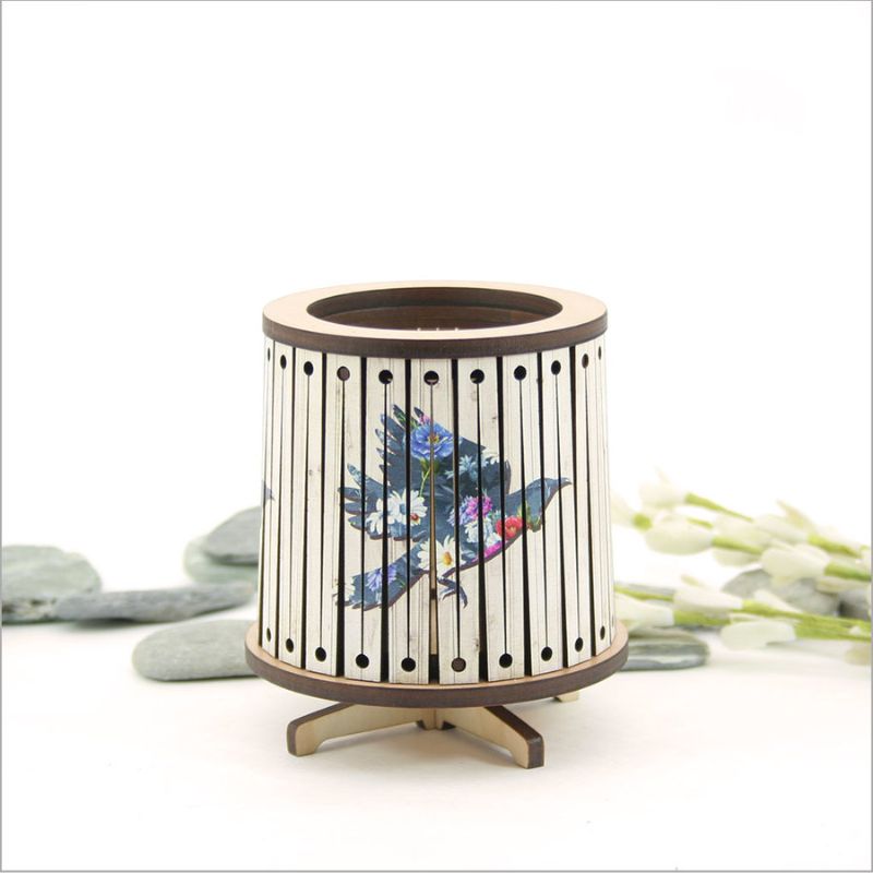 Round LED tealight holder in floral design, 8.5 cm, features color-changing LED candle for a cozy ambiance.