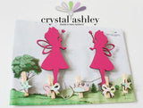 Whimsical fairy-themed pegs for displaying kids' artwork and photos, enhancing creativity in nurseries and playrooms.