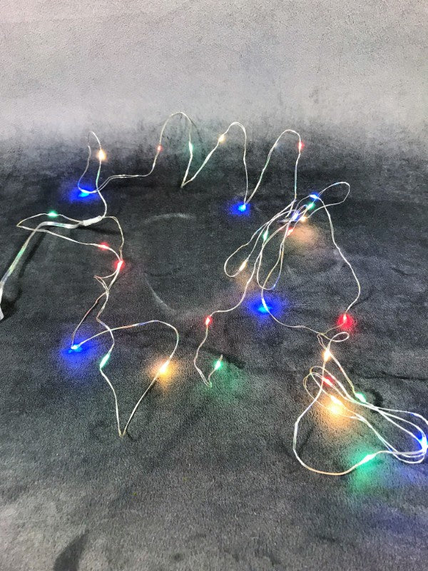 Multicolour Seed Lights with 30 lights, 300cm long, ideal for festive decor and creating a magical atmosphere indoors or outdoors.