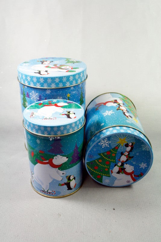 Set of 3 round metal tins featuring charming polar bear and penguin designs, perfect for storage and decor.