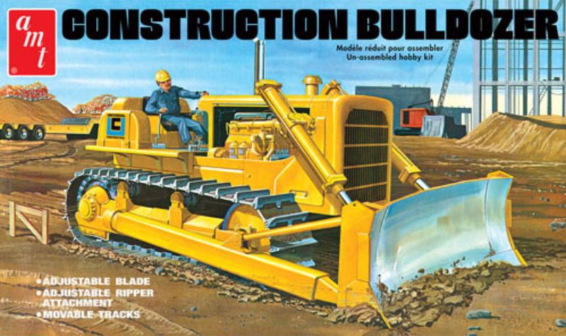 1/20 scale construction bulldozer model kit by AMT, unassembled, designed for hobbyists, requires glue and paint to complete.