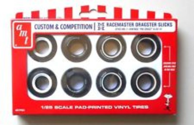 Authentic 1/25 drag slick tyre kitset by AMT, includes 8 unassembled tyres for model car customization.