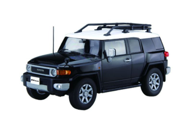 1/24 scale black Toyota FJ Cruiser plastic model kit from Fujimi, designed for creativity and assembly for ages 10 and up.