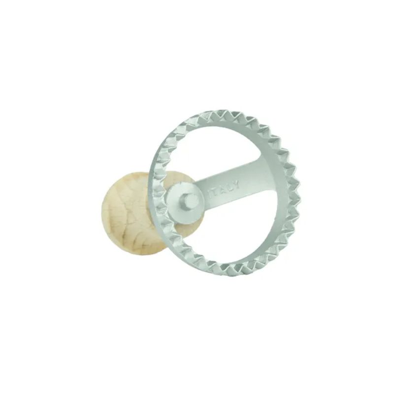 Round ravioli cutter (55mm) with beechwood handle and aluminum cutter for precise, homemade pasta creations.