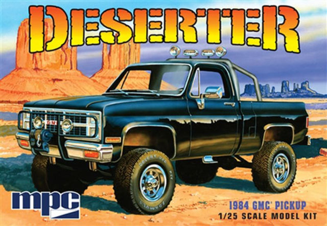 1/25 scale MPC model kit of '84 GMC Pickup in black, featuring precision parts for customizable assembly and showcasing vintage design.