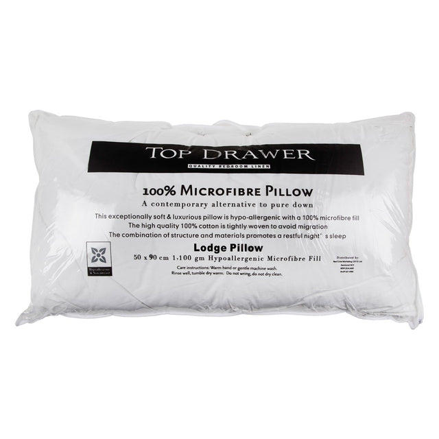 Luxurious 1100g microfibre pillow with a soft 100% cotton cover, offering support and comfort for a restful sleep.