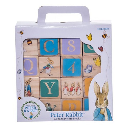 Wooden picture blocks featuring classic Beatrix Potter illustrations of Peter Rabbit, perfect for imaginative play and decor.