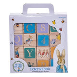 Wooden picture blocks featuring classic Beatrix Potter illustrations of Peter Rabbit, perfect for imaginative play and decor.