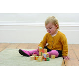 Wooden picture blocks featuring Peter Rabbit illustrations, perfect for play and decor, safe for toddlers and designed for creativity.