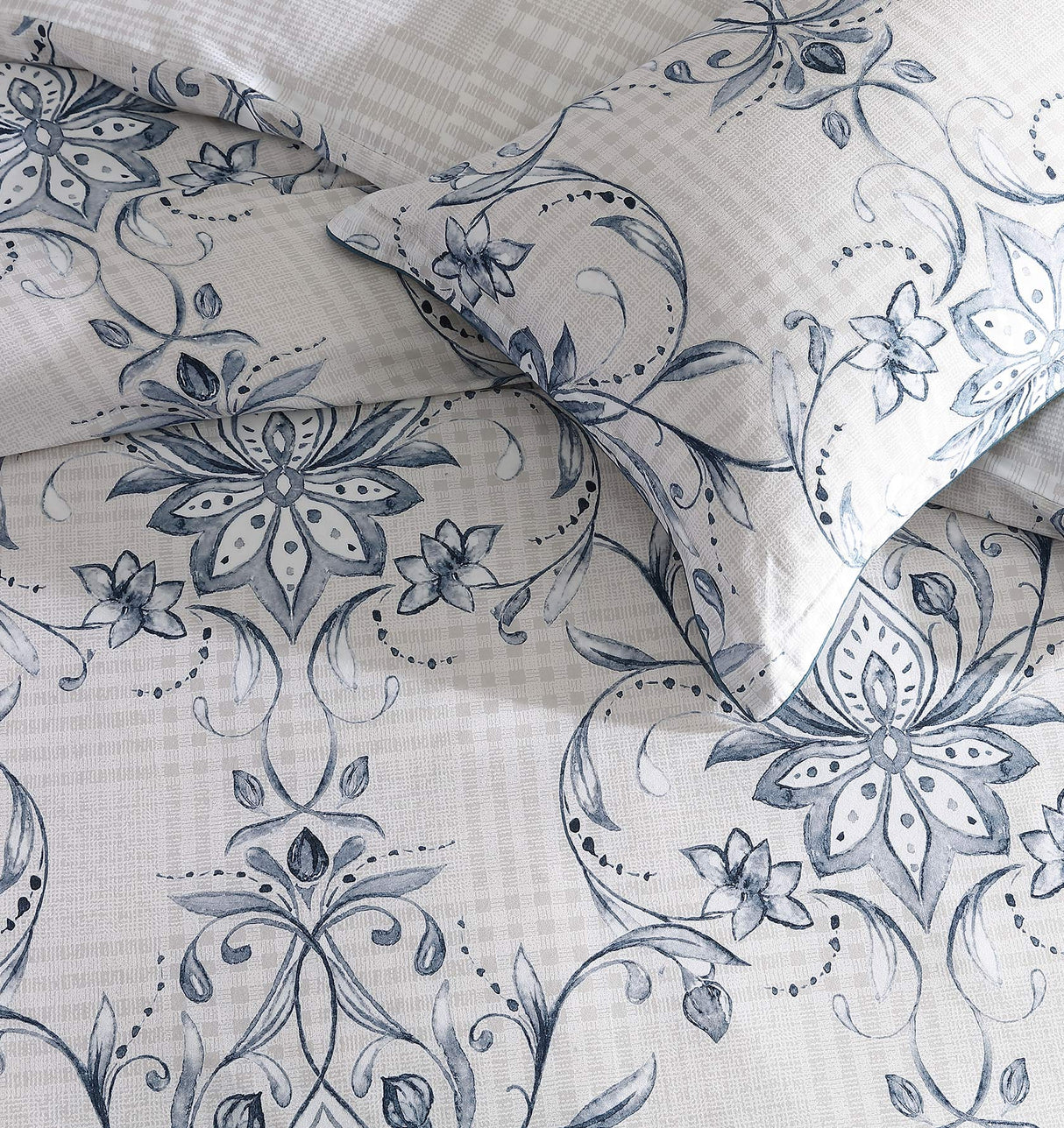 Super King Duvet Cover set featuring a modern damask design in crisp white, navy, and linen with houndstooth reverse and blue piping.