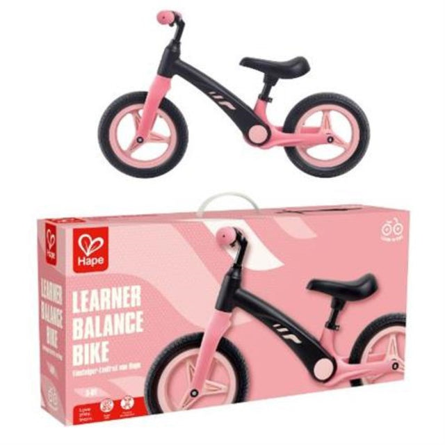 Hape Shock Absorbing Balance Bike in pink and black, designed for ages 3-6, features adjustable height, smooth ride, and durable tires.