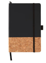 Lucca Hard Bound JournalBook features a sleek black PU cover, cork band, elastic closure, and 80 lined sheets for versatile writing.