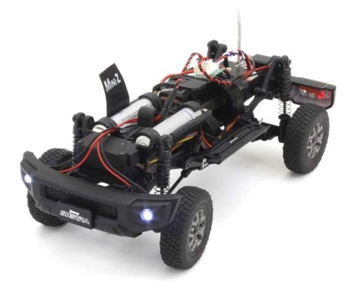 Radio Control MX-01 Suzuki Jimny Black Pearl, a detailed mini RC crawler with robust 4x4 chassis, perfect for off-road adventures.