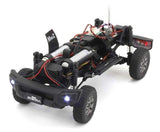 Radio Control MX-01 Suzuki Jimny Black Pearl, a detailed mini RC crawler with robust 4x4 chassis, perfect for off-road adventures.
