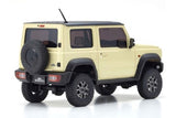 Detailed ivory Suzuki Jimny RC crawler with 4x4 chassis, perfect for off-road adventures and rock crawling.