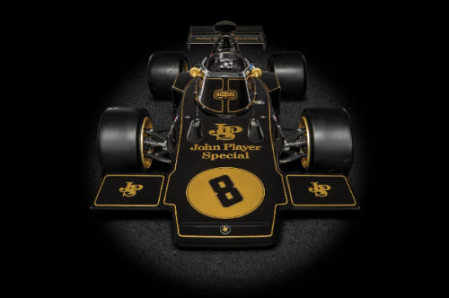 Detailed 1/8 scale diecast model of the iconic F1 Lotus 72, showcasing advanced aerodynamics and authentic features.
