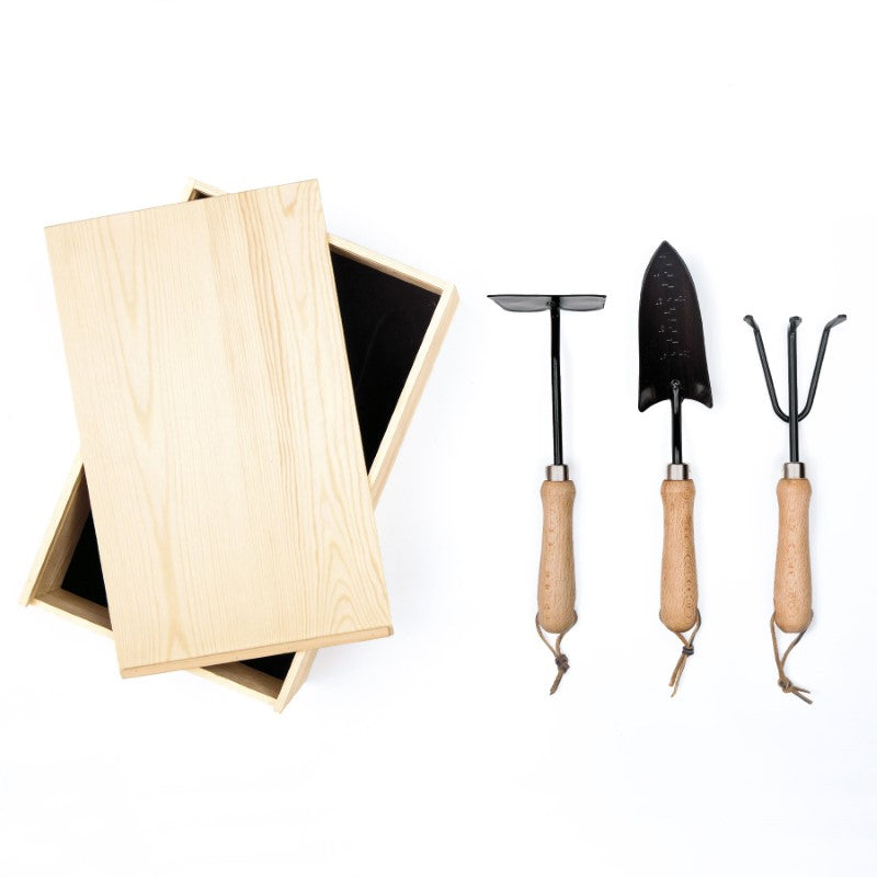 Premium 3-piece garden tool set in a natural pine box, featuring stainless steel tools and beech wood handles.