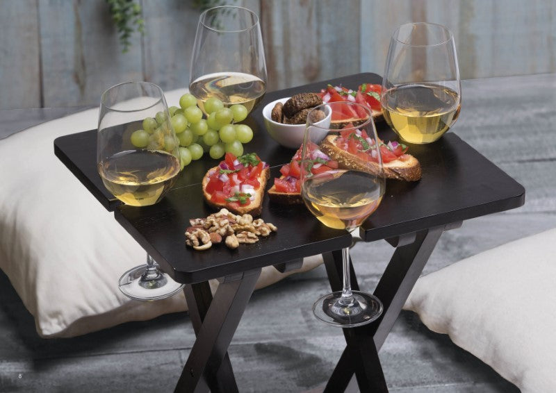 Stylish foldable bamboo table with wine glass holders, perfect for outdoor gatherings and easy to transport in a carry bag.