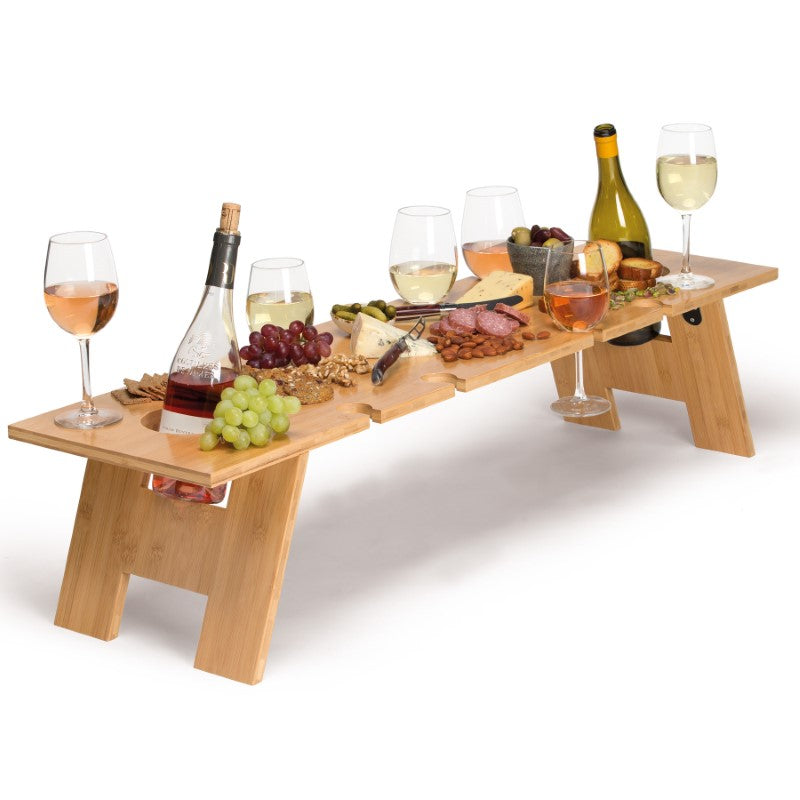 Elegant foldable bamboo dining table with holders for 8 glasses and 2 bottles, perfect for outdoor gatherings.