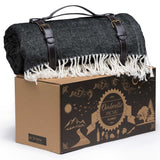 Ombrello Picnic Blanket with herringbone design, waterproof backing, and integrated umbrella hole for stylish outdoor comfort.