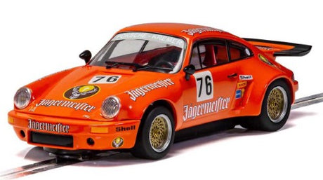 Alt text: "GT Porsche 911 RSR 3.0 #76 model in vibrant Jägermeister livery, showcasing 'whale tail' rear wing for slot car racing."