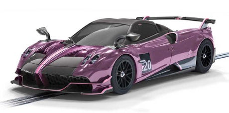Vibrant purple Pagani Huayra BC Roadster slot car with detailed design, perfect for racing and display.