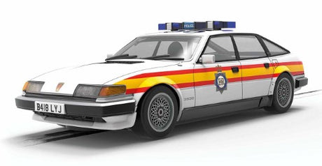 Police Rover SD1 slot car with authentic 1980s police markings, lights, and flashing roof light for thrilling races.