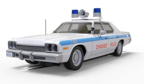 Blues Brothers Dodge Monaco slot car in blue and white, detailed replica for Scalextric racetracks and collectors.