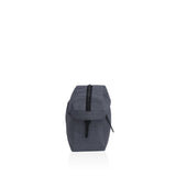 Stylish smpli Wetpac Wash Kit with durable fabric, zippered pockets, and organized mesh compartments for travel grooming essentials.