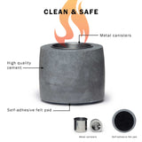 Sleek black Ambi Flame Pit made of cement, featuring stainless steel canisters and presented in a natural pine wood box.