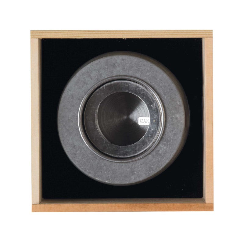 Ambi Flame Pit in a natural pine box, featuring a sturdy cement design and removable stainless steel canisters for indoor/outdoor use.