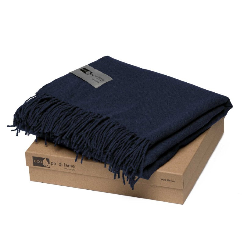 Luxurious 100% Merino wool blanket throw with herringbone weave, 10cm fringes, perfect for cozy nights and elegant home decor.