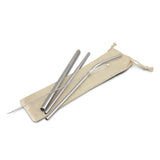 Set of three reusable stainless steel straws in a cotton bag, perfect for eco-friendly sipping and stylish drinks.