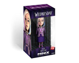 Colorful collectible figurine of Enid Sinclair from Nevermore Academy, embodying positivity and friendship with Wednesday Addams.