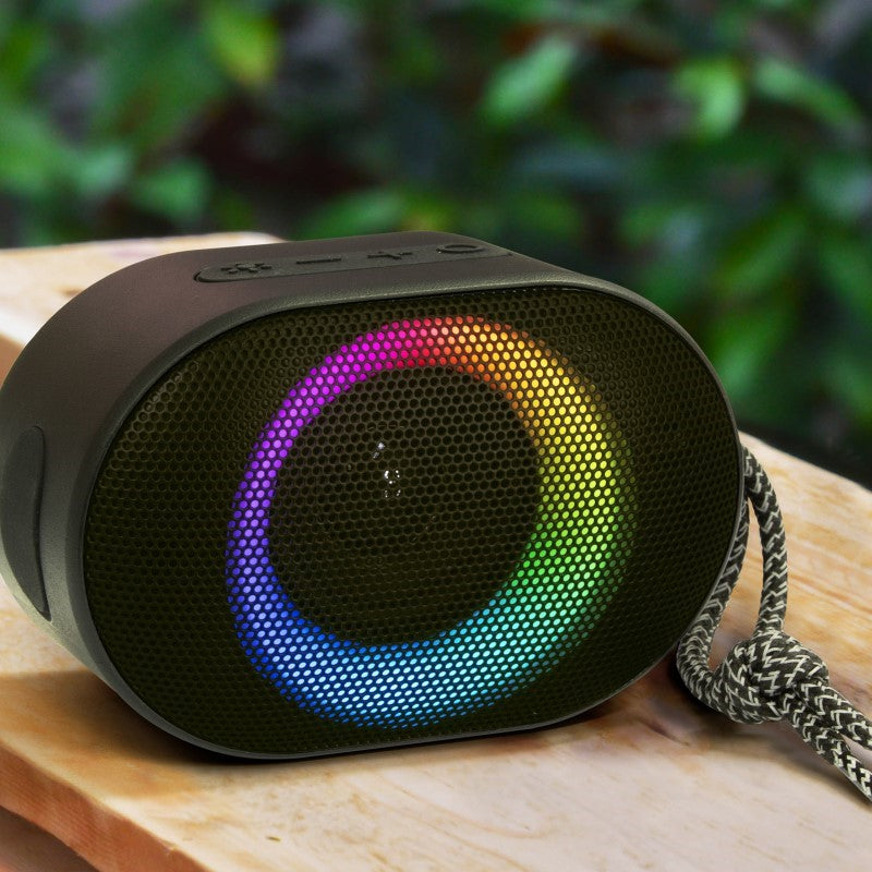 Compact black outdoor Bluetooth speaker with 7W power, water-resistant design, ambient lights, and built-in microphone.