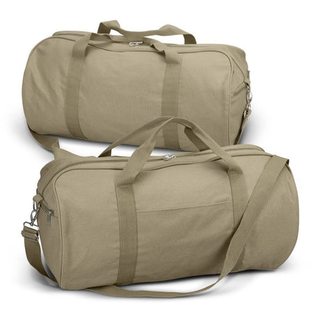 Beige 33L canvas duffle bag with webbing handles, padded shoulder strap, and external pocket for travel convenience.