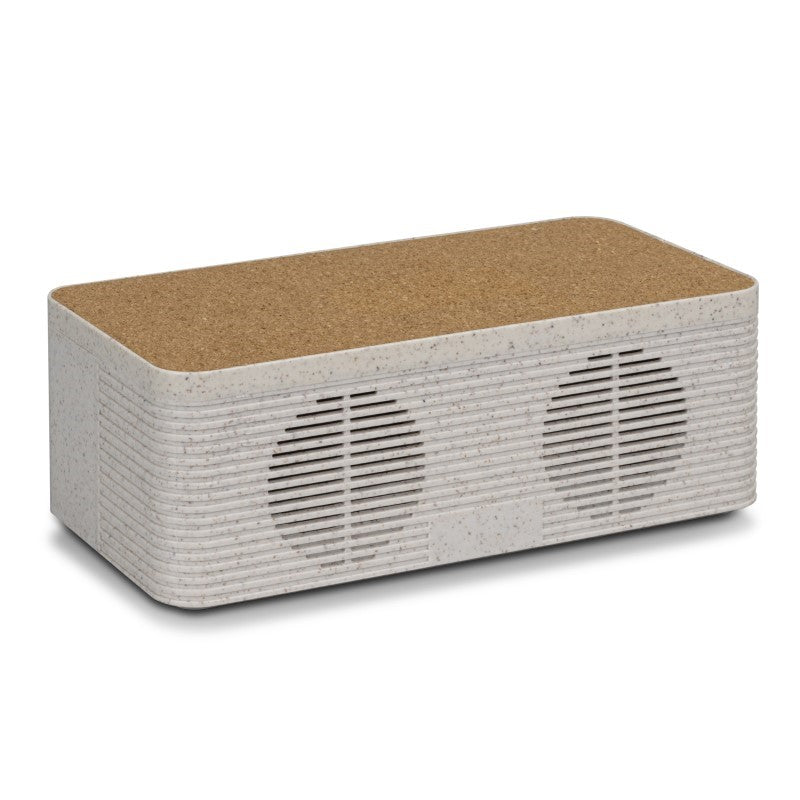 Eco-friendly NATURA Oaken Wireless Speaker Charger in natural materials, offering wireless charging and immersive 5W audio.