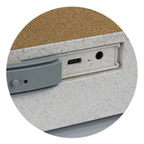 Natural wireless speaker charger made from eco-friendly materials, offering Bluetooth 5.0, 5W sound, and sleek design.