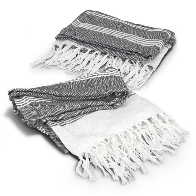 Charcoal Ohau Throw Blanket with textured pattern, fringed trim, and made from 50% recycled cotton, 500 GSM for warmth.