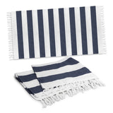 Cotton Towel - Okana in navy, featuring rustic stripes, fringed trim, and made from 100% cotton for beach or poolside use.