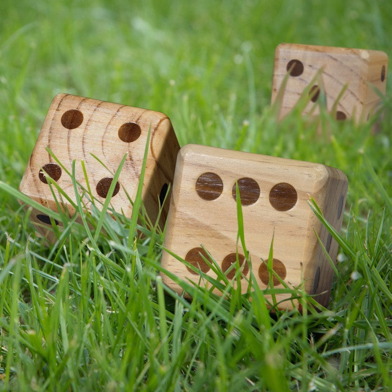 Natural wooden yard dice set for outdoor fun, includes six 9cm dice and a canvas drawstring bag for easy storage.