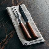 Elegant carving set with Acacia wooden handles and stainless steel blade, presented in a natural gift box.