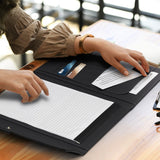Elegant black A4 portfolio made of Smart PU leather, featuring a dome closure, notepad, and card holders for professionals.