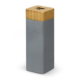 Eco-friendly power bank in charcoal with bamboo trim, 1200mAh capacity, LED indicator, and quick recharge in 4 hours.