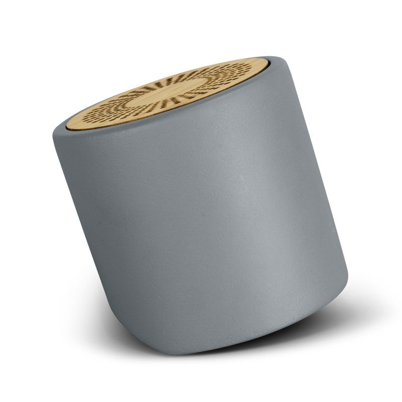Bluetooth mini speaker in charcoal with unique limestone casing and bamboo grill, offering 3W sound and 3 hours playtime.