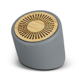 Stylish charcoal Bluetooth mini speaker with unique limestone casing and bamboo grill, offering 3W sound and 3-hour playtime.