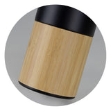 Mica 560ml Vacuum Bottle in Black/Natural, featuring insulated stainless steel, detachable tea infuser, and bamboo trim for stylish hydration.