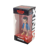 Collectible figurine of Eleven from Stranger Things, showcasing detailed likeness to Millie Bobby Brown and her psychokinetic powers.