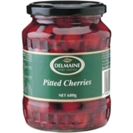 Delmaine's 680g jar of pitted sour Morello cherries in syrup, ideal for desserts, pies, tarts, and pairing with light meats.