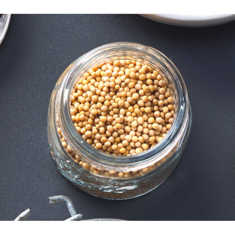 Premium yellow mustard seeds in a 500g pack, ideal for seasoning and pickling with a mild, zesty flavor.